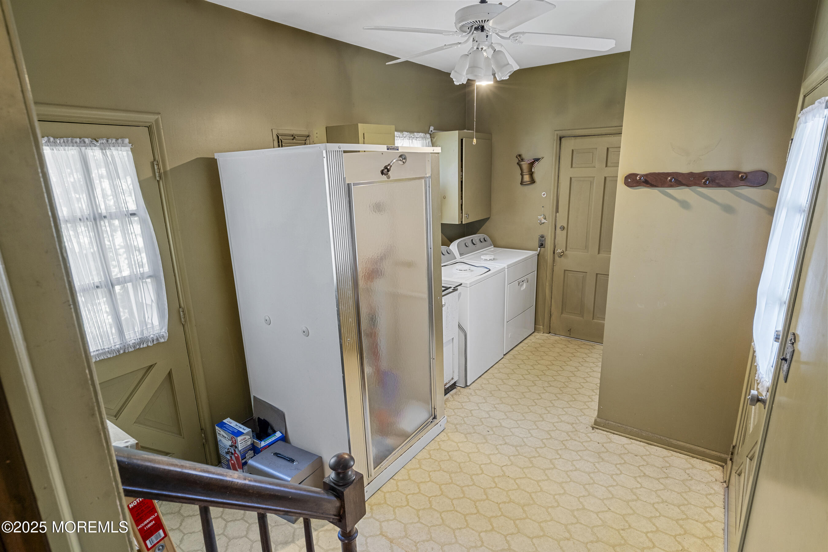 647 Valley Road Brielle, NJ 08730 - Photo 27 of 38 a view of a storage & utility room with a washer dryer
