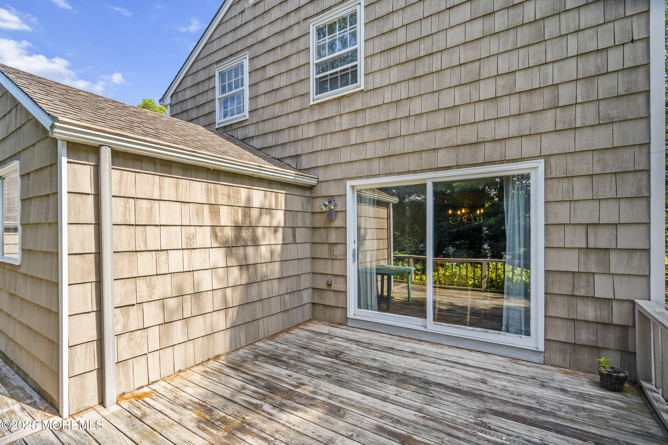 647 Valley Road Brielle, NJ 08730 - Photo 28 of 38 a view of a brick house with a large window