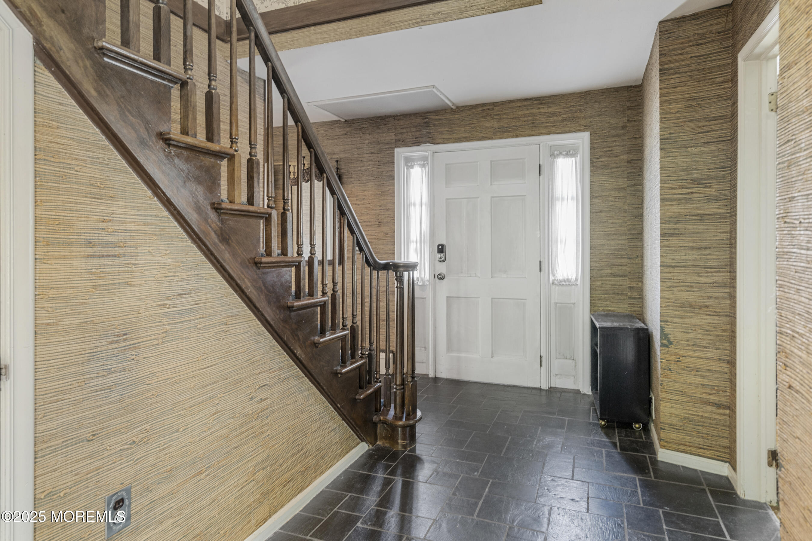 647 Valley Road Brielle, NJ 08730 - Photo 6 of 38 a view of staircase with wooden floor and staircase