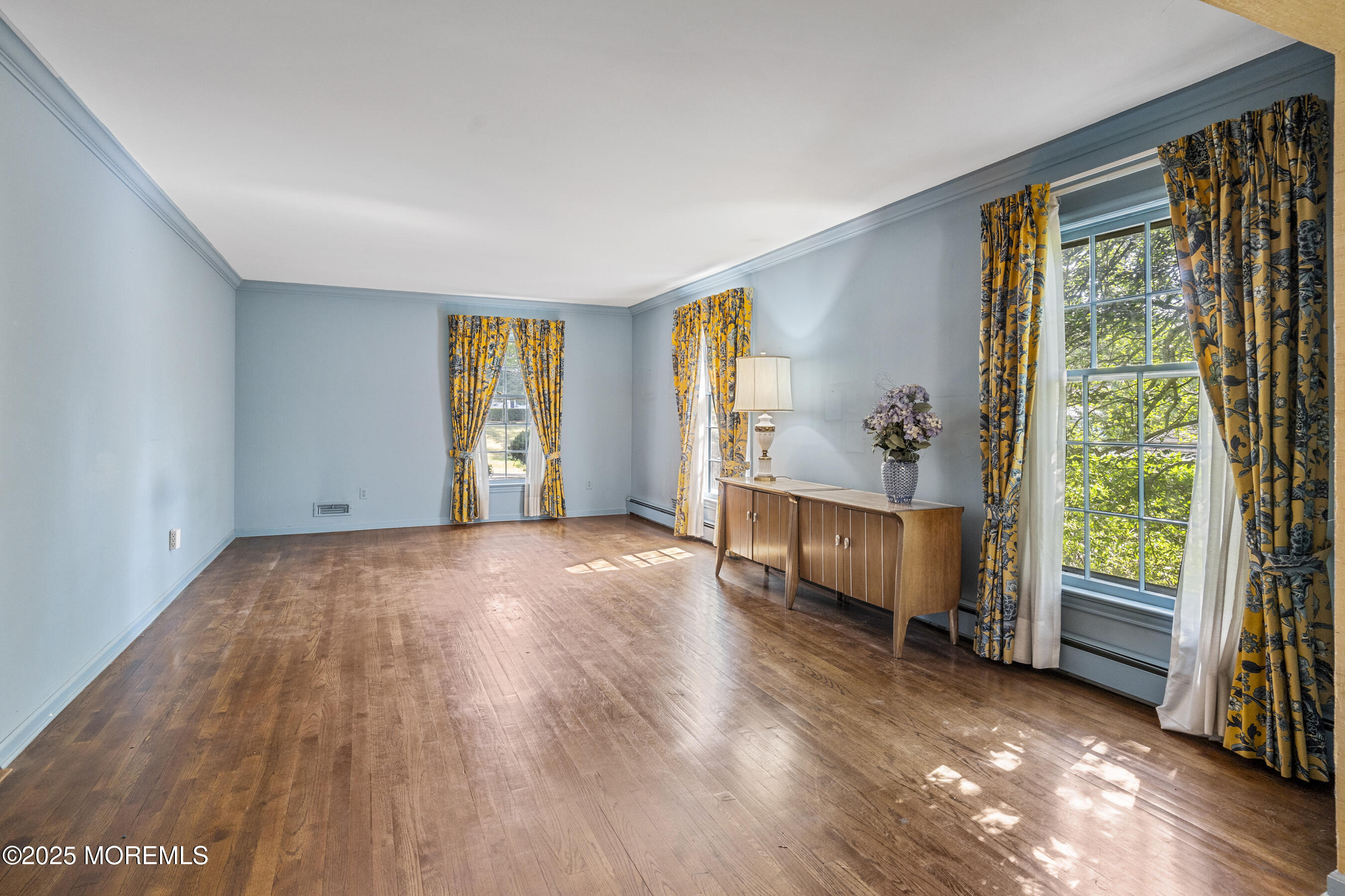 647 Valley Road Brielle, NJ 08730 - Photo 7 of 38 wooden floor in an empty room with a window