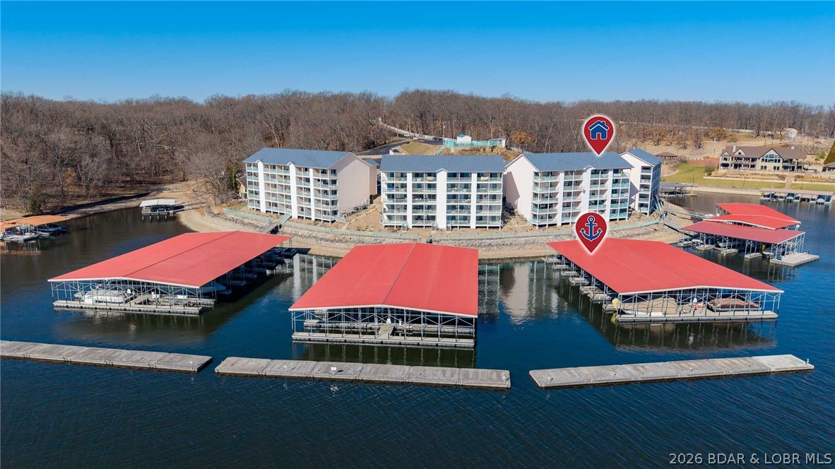 164 Sac Road, Unit 301B Sunrise Beach, MO 65079 - Photo 2 of 34 wave-break protected community dock