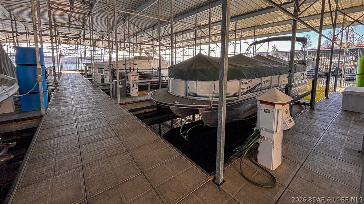 164 Sac Road, Unit 301B Sunrise Beach, MO 65079 - Photo 31 of 34 14x40 slip with remote hoist included.