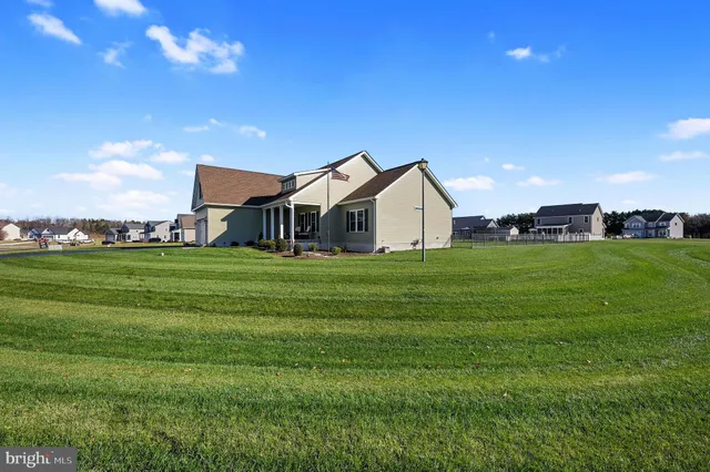a view of a house with a big yard