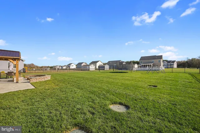 a view of a house with a big yard