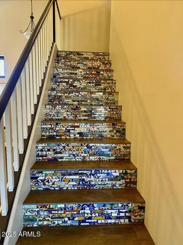 a bathroom with a granite countertop sink a toilet and shower