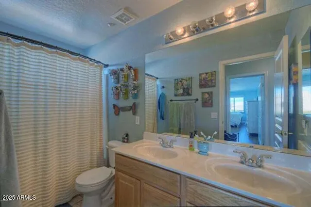 a view of a street with a building