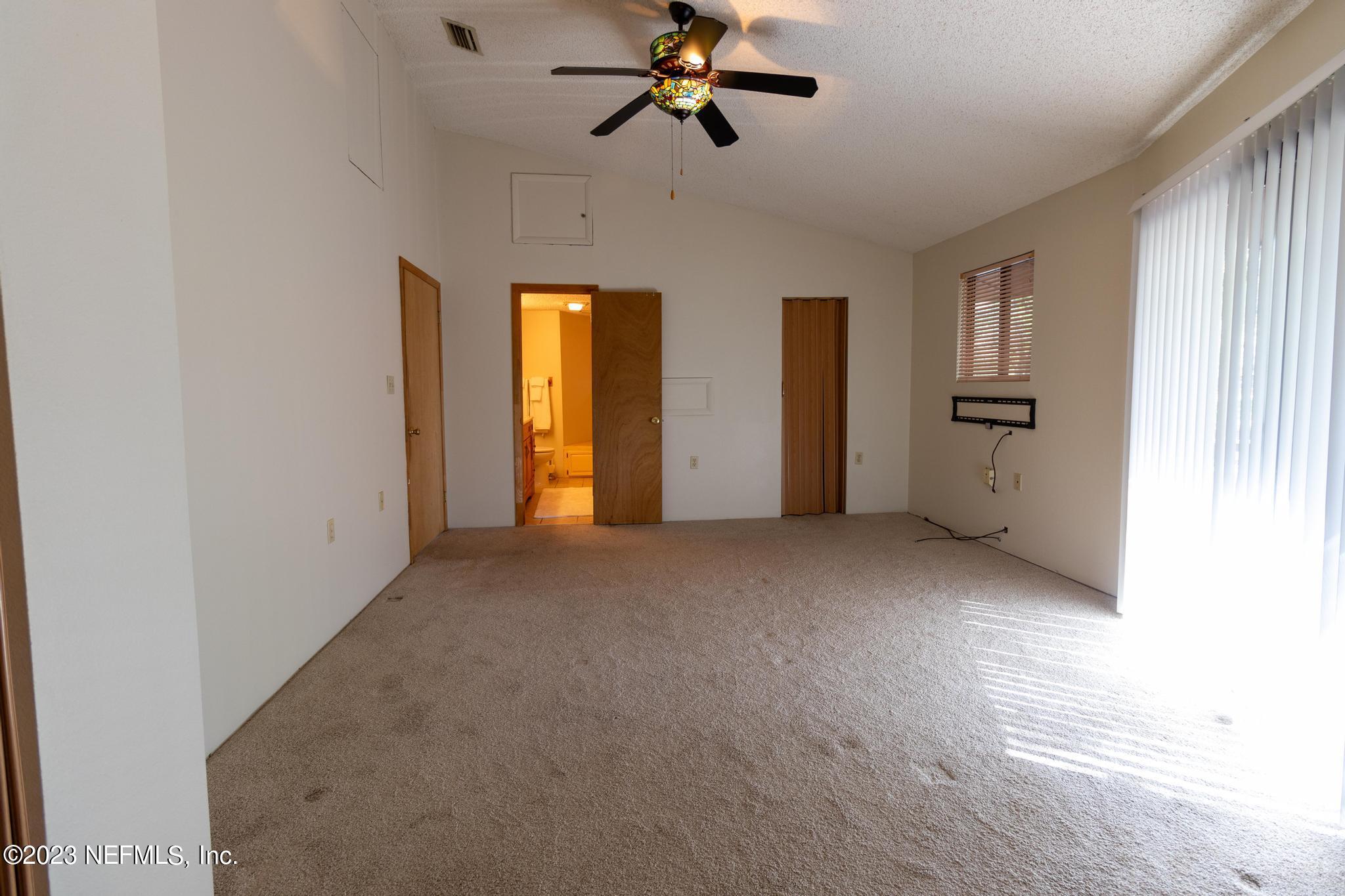 1151 Southeast 46th Loop Keystone Heights, FL 32656 - Photo 13 of 39 a view of an empty room with a window