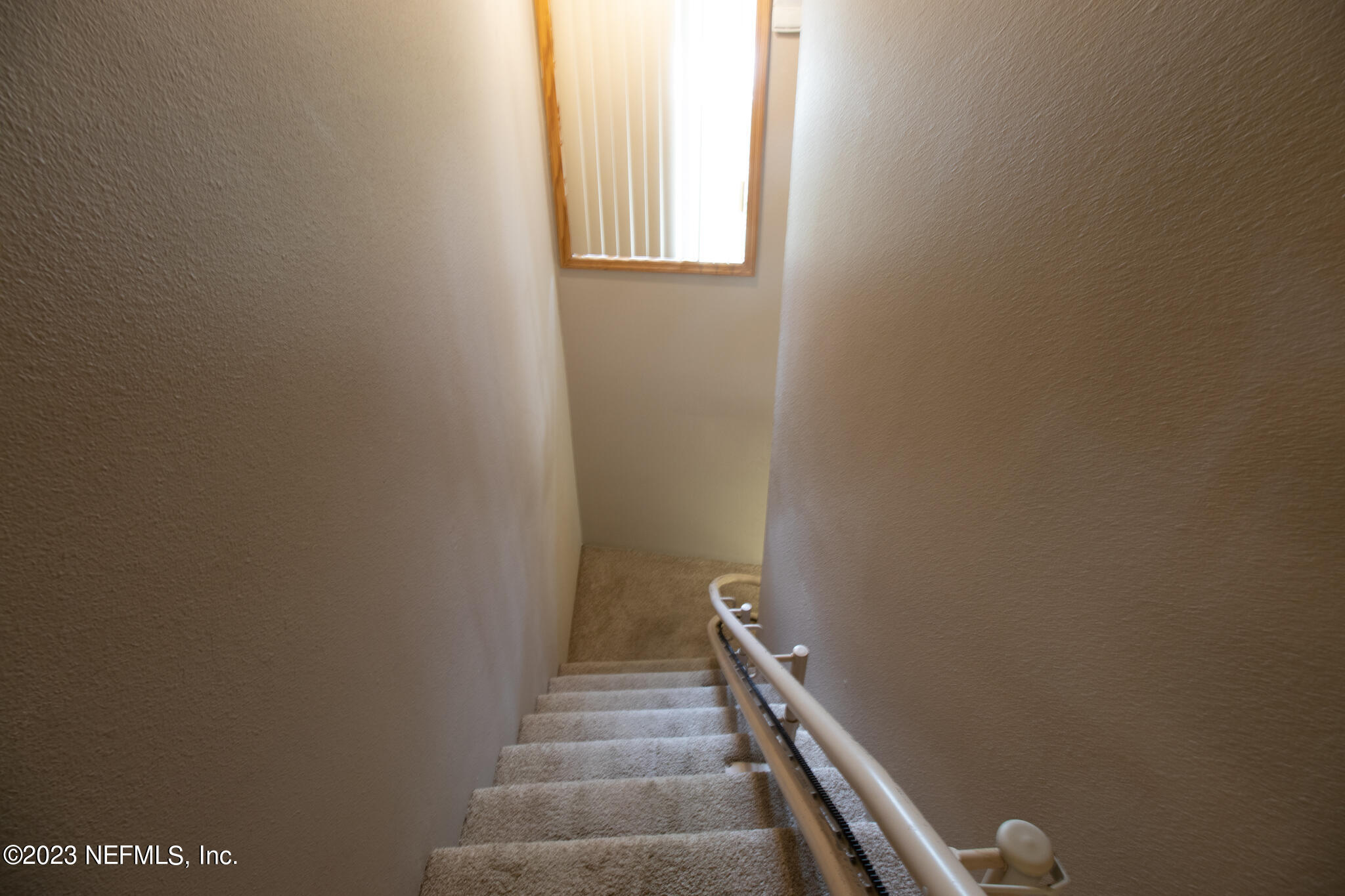 1151 Southeast 46th Loop Keystone Heights, FL 32656 - Photo 18 of 39 a view of a hallway with stairs