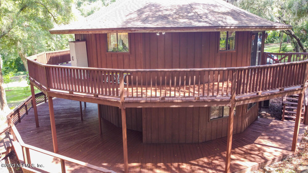 1151 Southeast 46th Loop Keystone Heights, FL 32656 - Photo 2 of 39 a view of a balcony with furniture