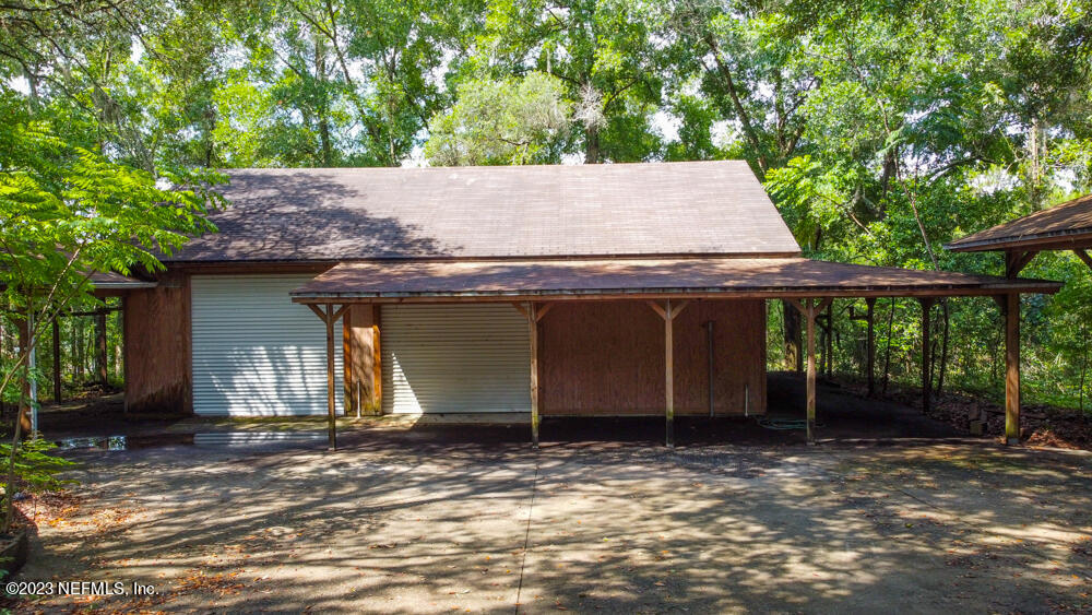 1151 Southeast 46th Loop Keystone Heights, FL 32656 - Photo 30 of 39 front view of a house with a yard