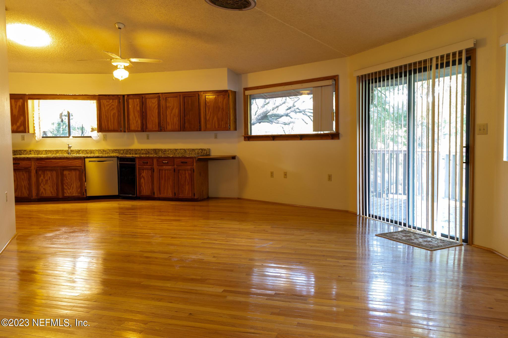 1151 Southeast 46th Loop Keystone Heights, FL 32656 - Photo 7 of 39 a large kitchen with a large window