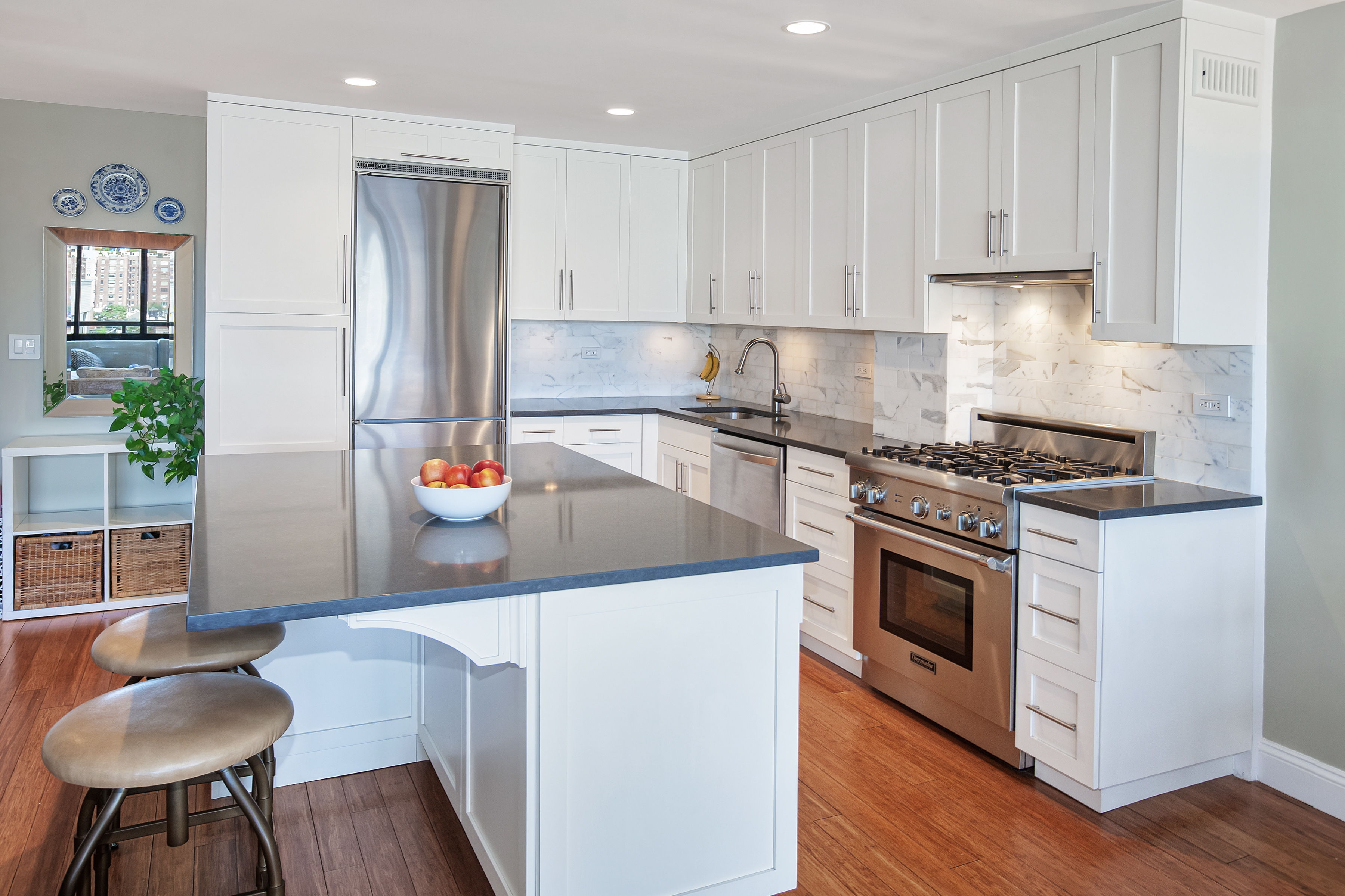 510 East 80th Street, Unit 15D Manhattan, NY 10075 - Photo 1 of 8 a kitchen with stainless steel appliances granite countertop a stove a sink and a refrigerator
