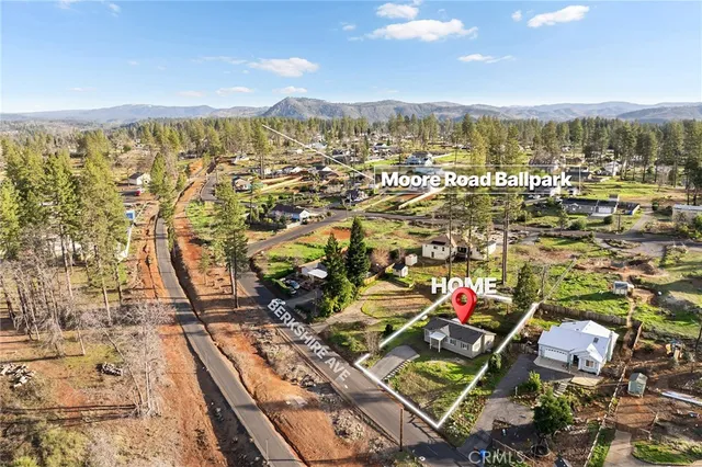 an aerial view of residential building with parking space