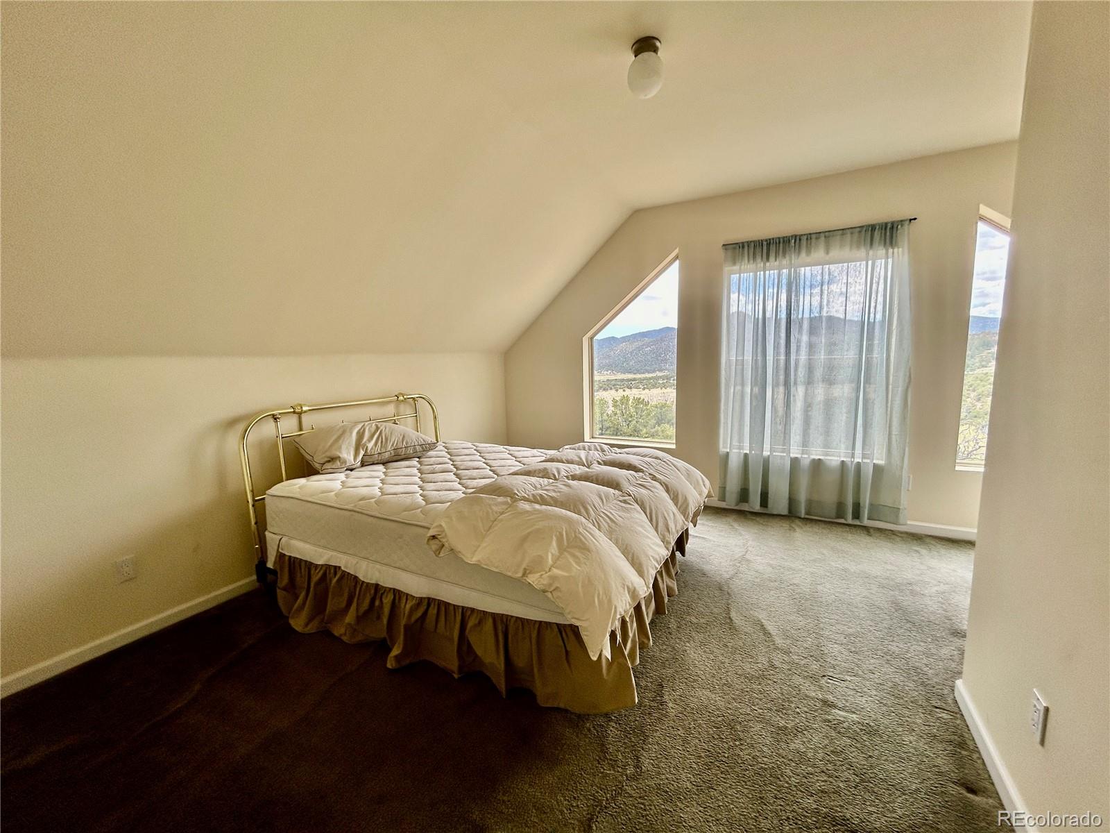 52601 County Rd LL56 Villa Grove, CO 81155 - Photo 11 of 33 a bedroom with a bed and a window