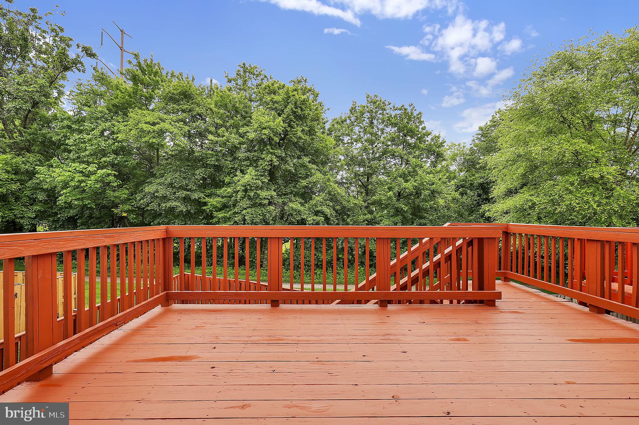 7150 Natures Road Columbia, MD 21046 - Photo 35 of 45 a view of a wooden deck