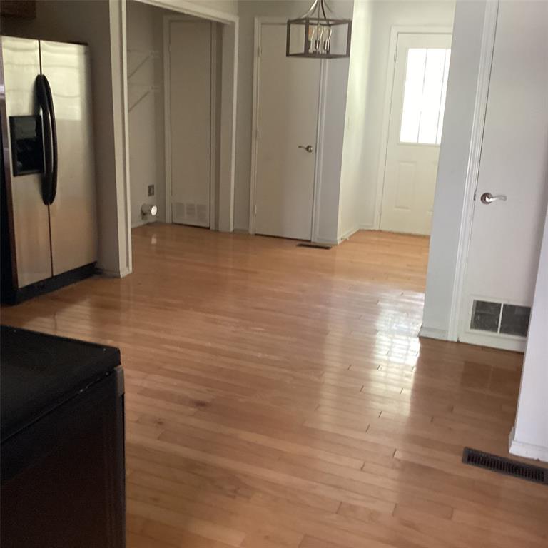 1506 South Travis Street Denison, TX 75021 - Photo 10 of 22 View into open kitchen area.