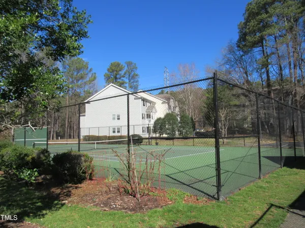 a lake view with a playing court