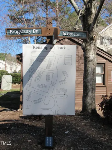 a view of a cars parked in front of a house