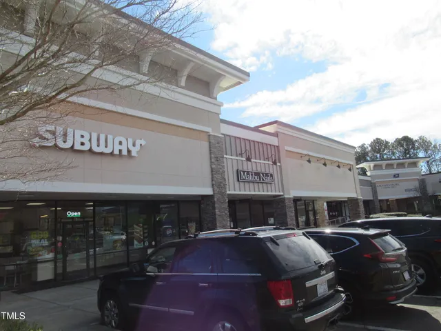 a front view of a building with street