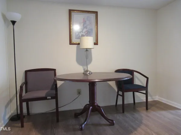 a view of a workspace with furniture