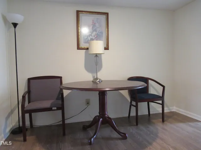 a view of a workspace with furniture