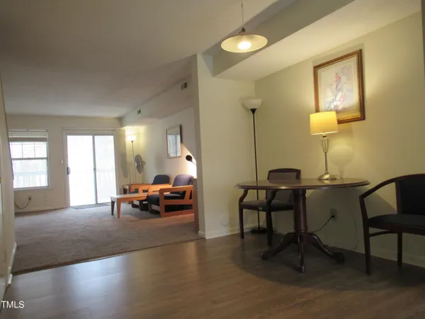 a living room with furniture and a table