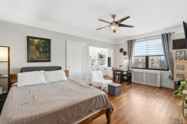 a bathroom with a sink a shower and a mirror