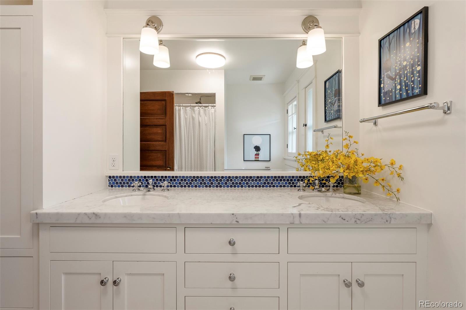 720 Franklin Street Denver, CO 80218 - Photo 21 of 39 a bathroom with a sink and a mirror