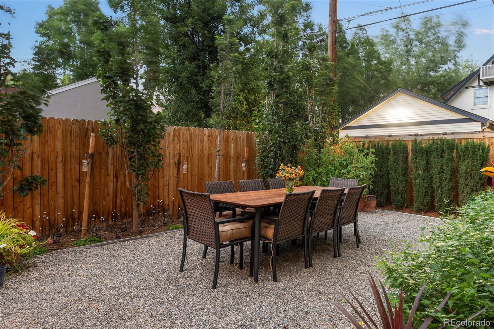 720 Franklin Street Denver, CO 80218 - Photo 39 of 39 a view of a dinning table and chairs in the patio