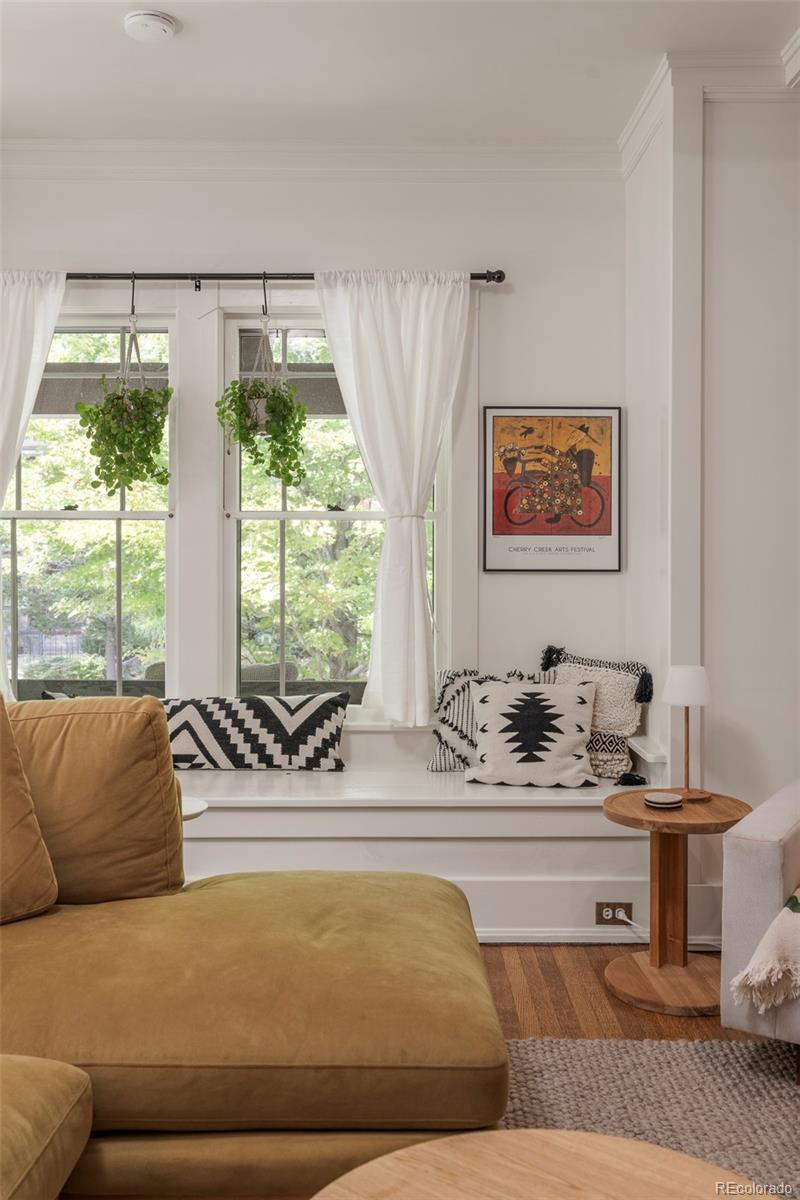 720 Franklin Street Denver, CO 80218 - Photo 6 of 39 a living room with furniture and large windows
