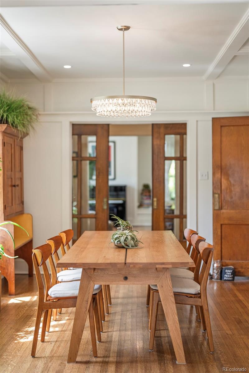 720 Franklin Street Denver, CO 80218 - Photo 8 of 39 a view of a dining room with furniture window and wooden floor