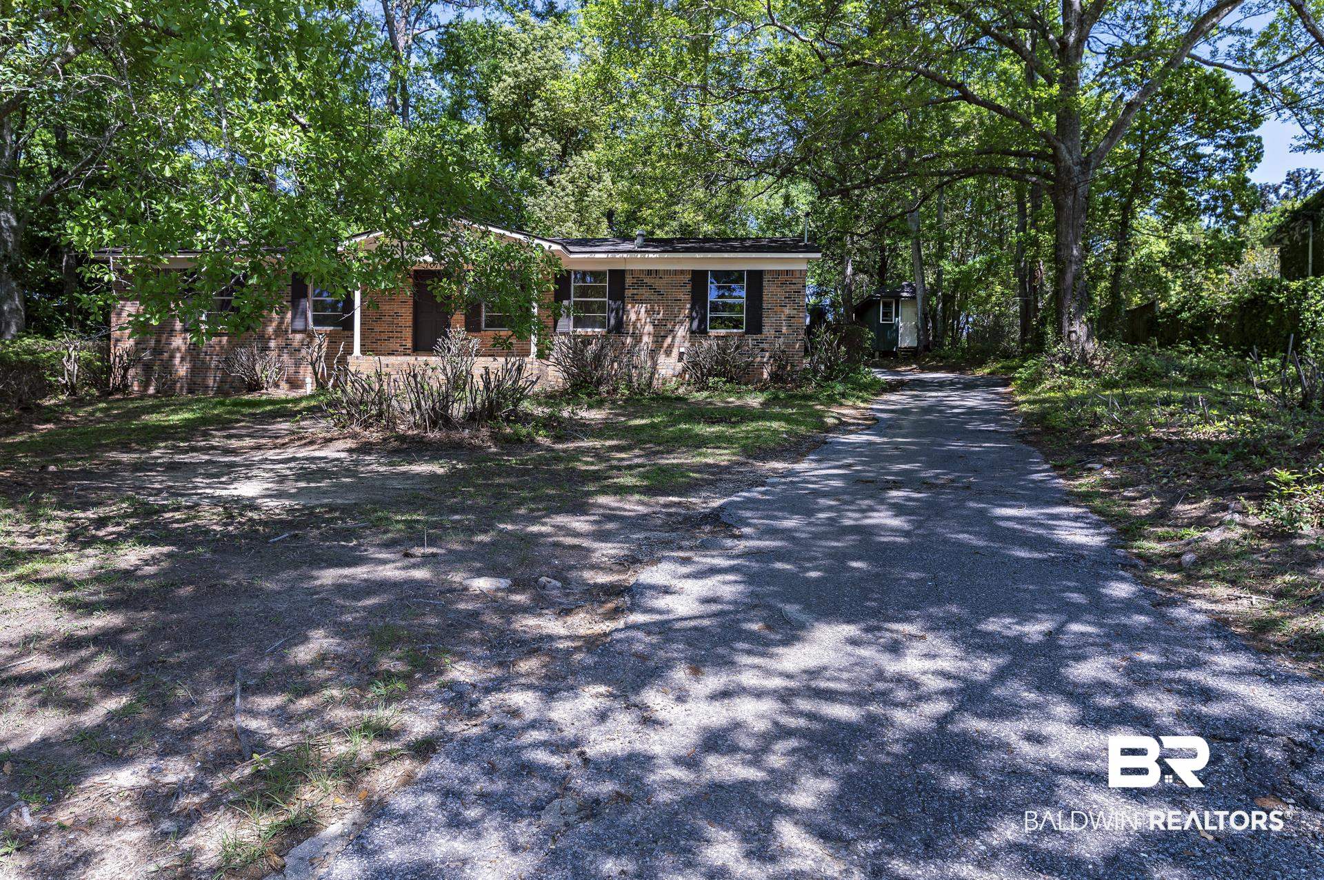 707 Johnson Avenue Fairhope, AL 36532 - Photo 7 of 38 Single story home with aphalt driveway and brick siding