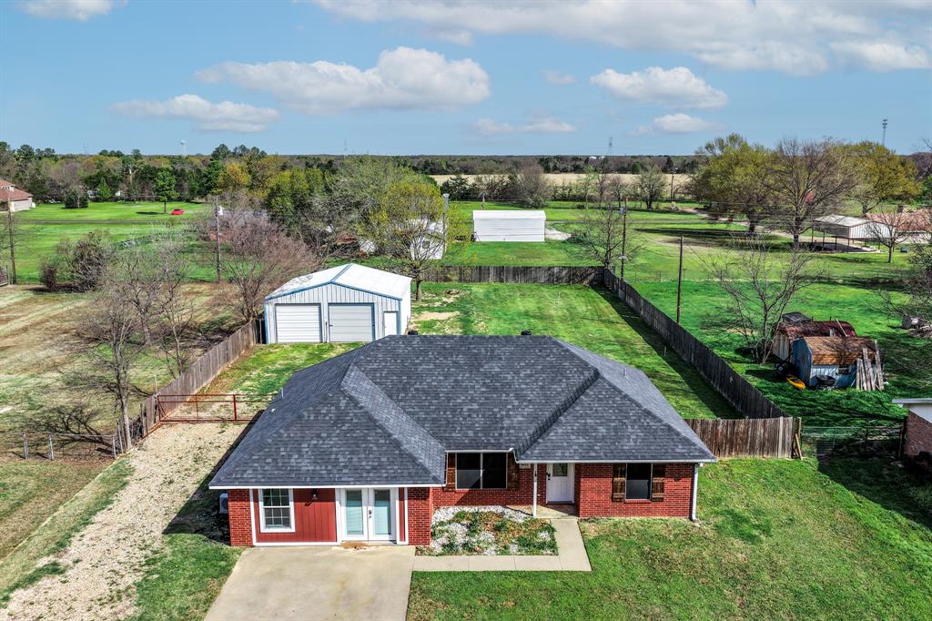 903 Amy Way Bonham, TX 75418 - Photo 9 of 27 Aerial view of property and surrounding area