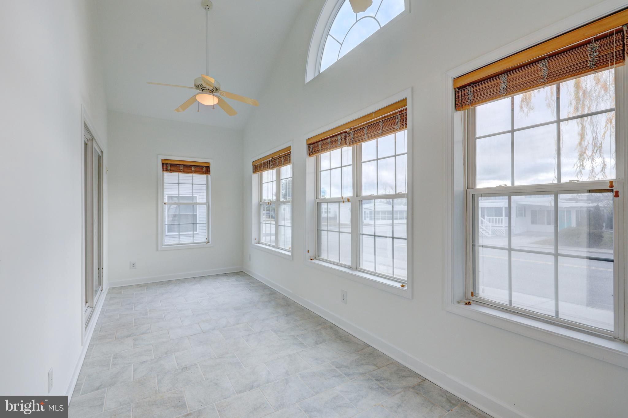 13225 Colonial Road Ocean City, MD 21842 - Photo 4 of 31 Bright sunroom with plenty of natural light