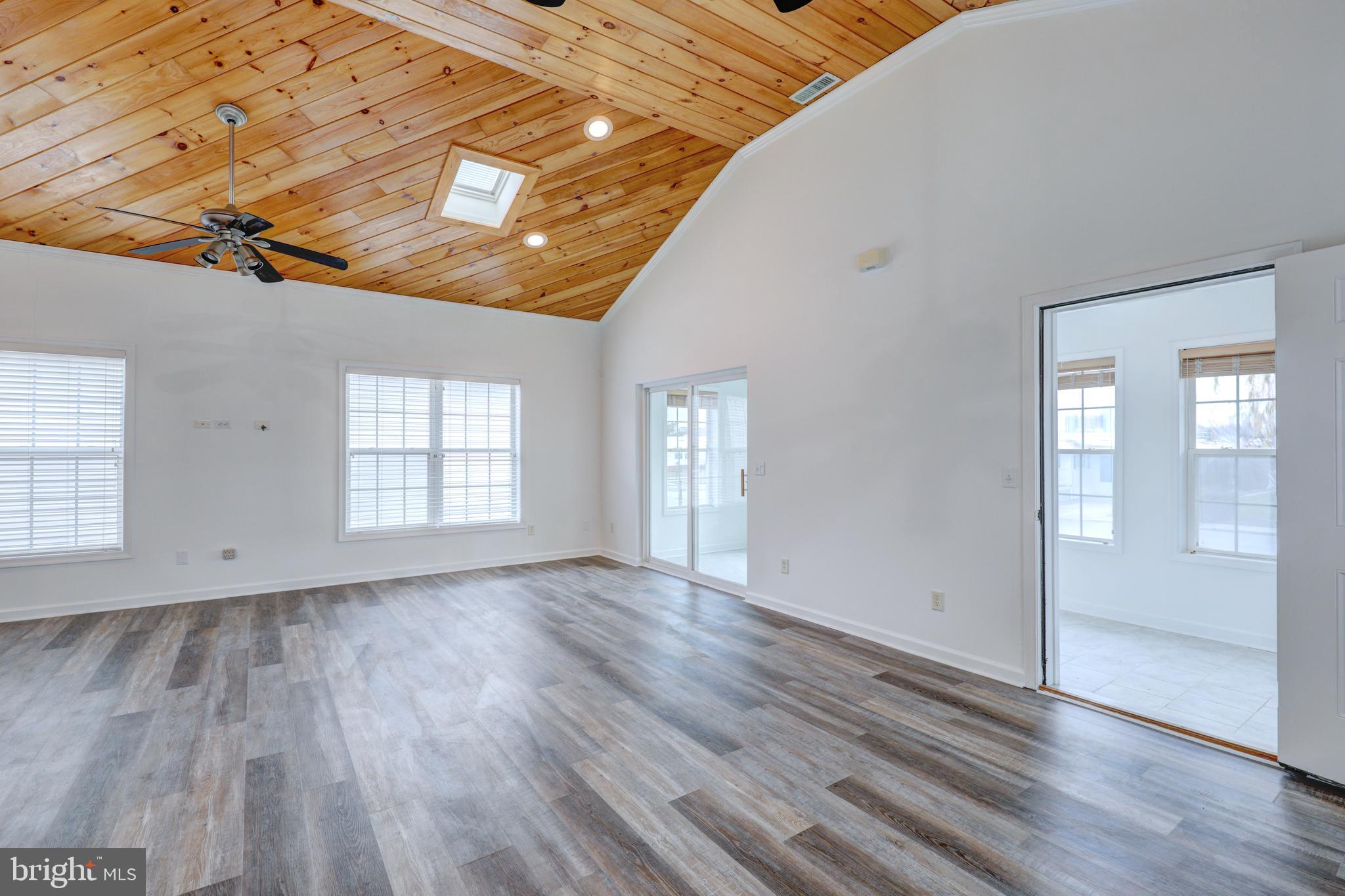 13225 Colonial Road Ocean City, MD 21842 - Photo 6 of 31 Brand new laminate plank floors throughout