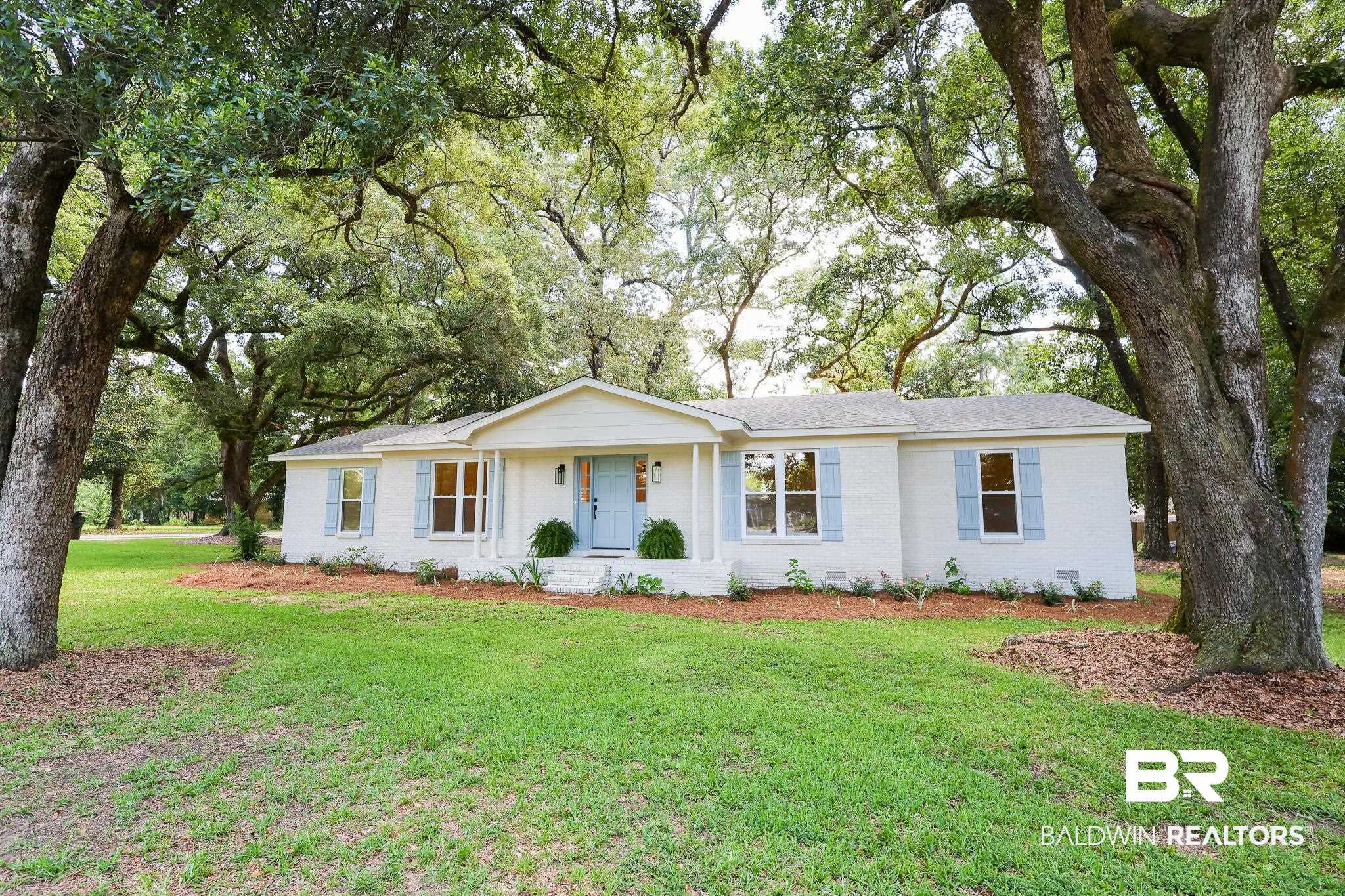 12190 Pecan Grove Street Magnolia Springs, AL 36555 - Photo 35 of 45 Ranch-style home with a front yard