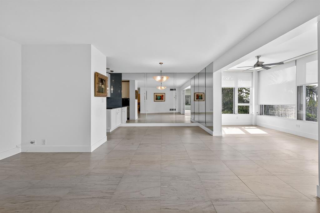 44 Cocoanut Row, Unit 507A Palm Beach, FL 33480 - Photo 12 of 60 a view of a big room with a chandelier