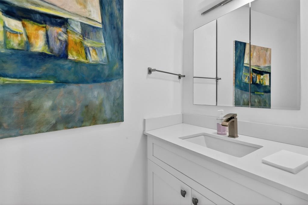 44 Cocoanut Row, Unit 507A Palm Beach, FL 33480 - Photo 21 of 60 a bathroom with a sink and a mirror