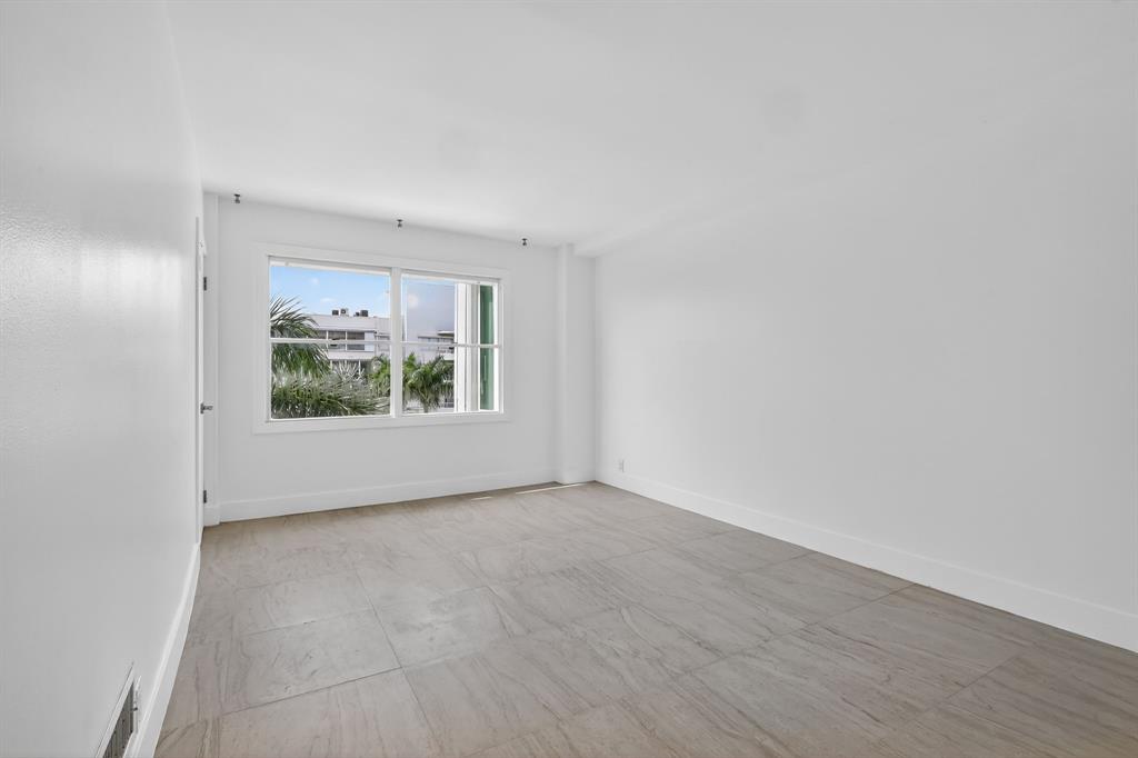 44 Cocoanut Row, Unit 507A Palm Beach, FL 33480 - Photo 27 of 60 a view of an empty room with a window