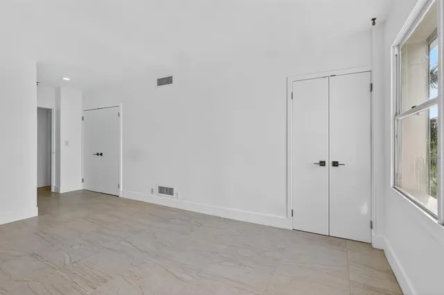 a view of a balcony with an outdoor space