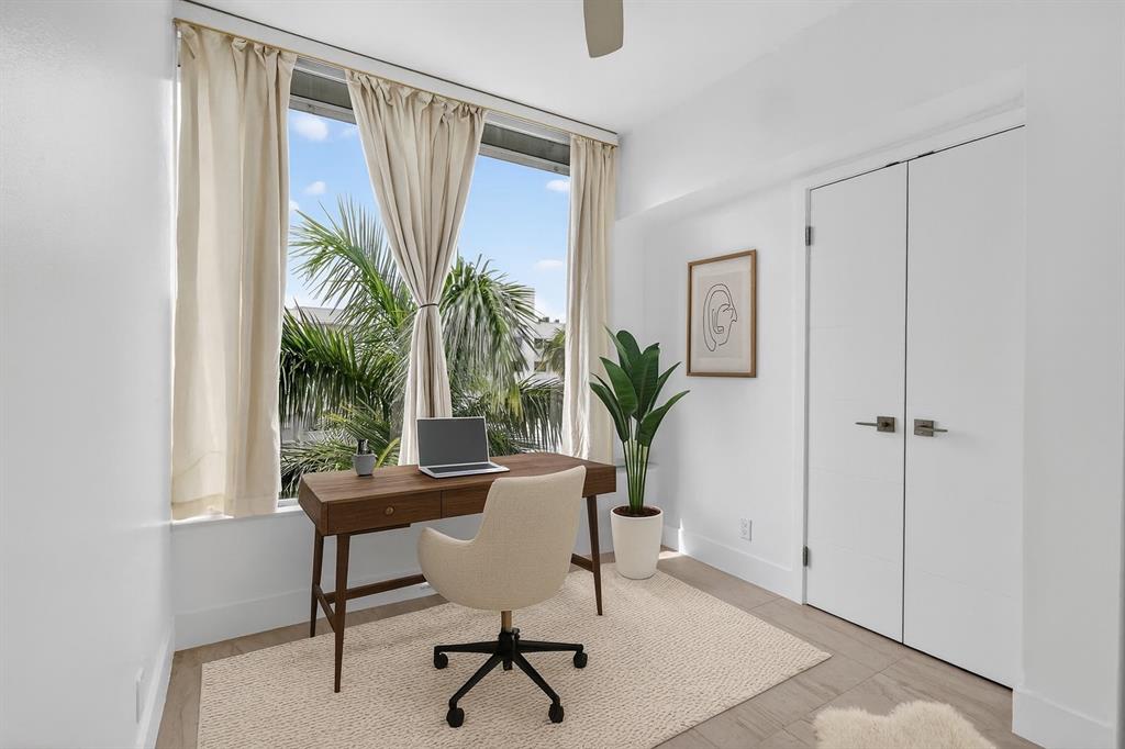 44 Cocoanut Row, Unit 507A Palm Beach, FL 33480 - Photo 3 of 60 a workspace with furniture and a window