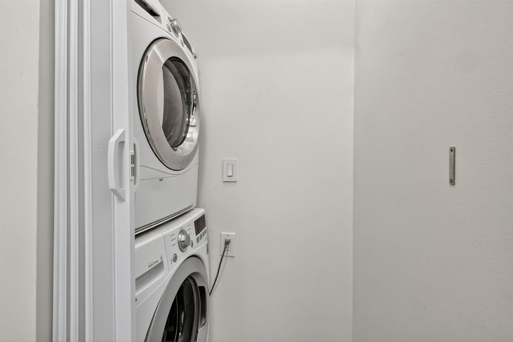 44 Cocoanut Row, Unit 507A Palm Beach, FL 33480 - Photo 31 of 60 a utility room with dryer and washer