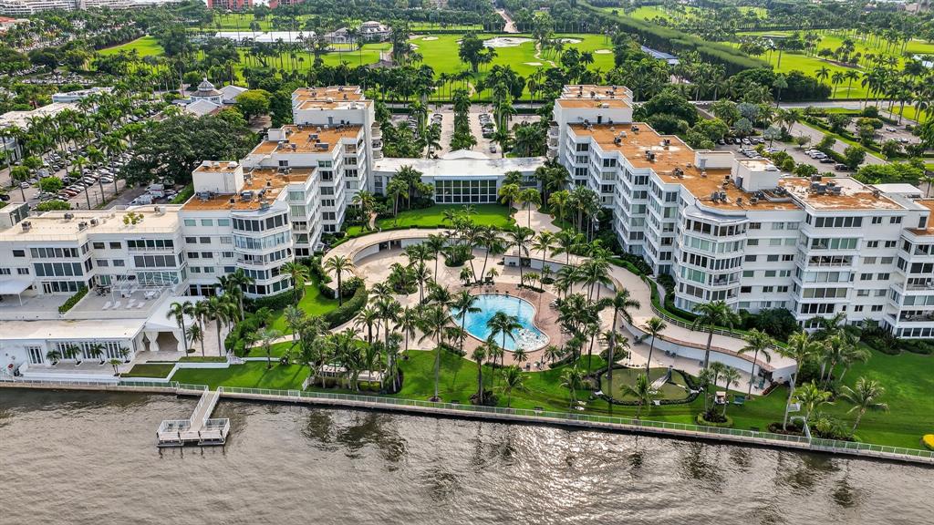 44 Cocoanut Row, Unit 507A Palm Beach, FL 33480 - Photo 41 of 60 an aerial view of a house with a garden and outdoor seating