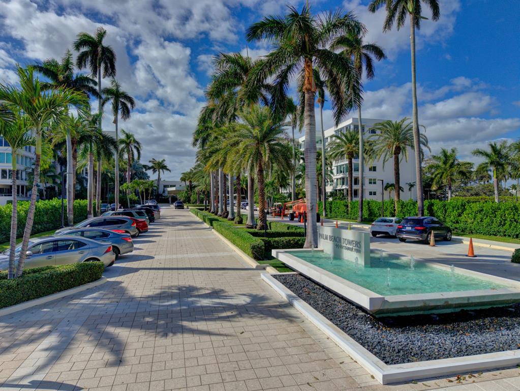 44 Cocoanut Row, Unit 507A Palm Beach, FL 33480 - Photo 55 of 60 a view of a backyard with palm trees