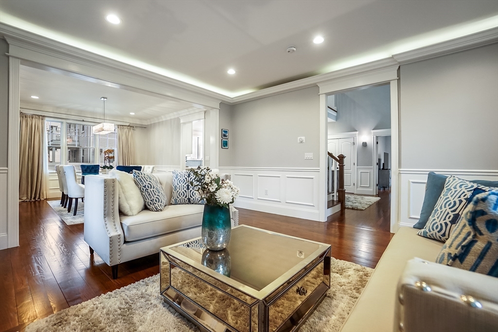 57 Walnut Street Newton, MA 02460 - Photo 13 of 39 a living room with furniture wooden floor and a table