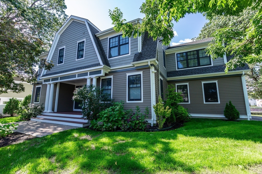 57 Walnut Street Newton, MA 02460 - Photo 3 of 39 a front view of a house with garden