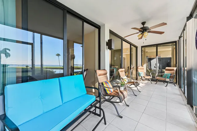a view of a livingroom with furniture and a table