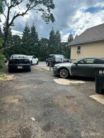 a car parked in front of a house