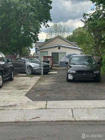 a car parked in front of a house