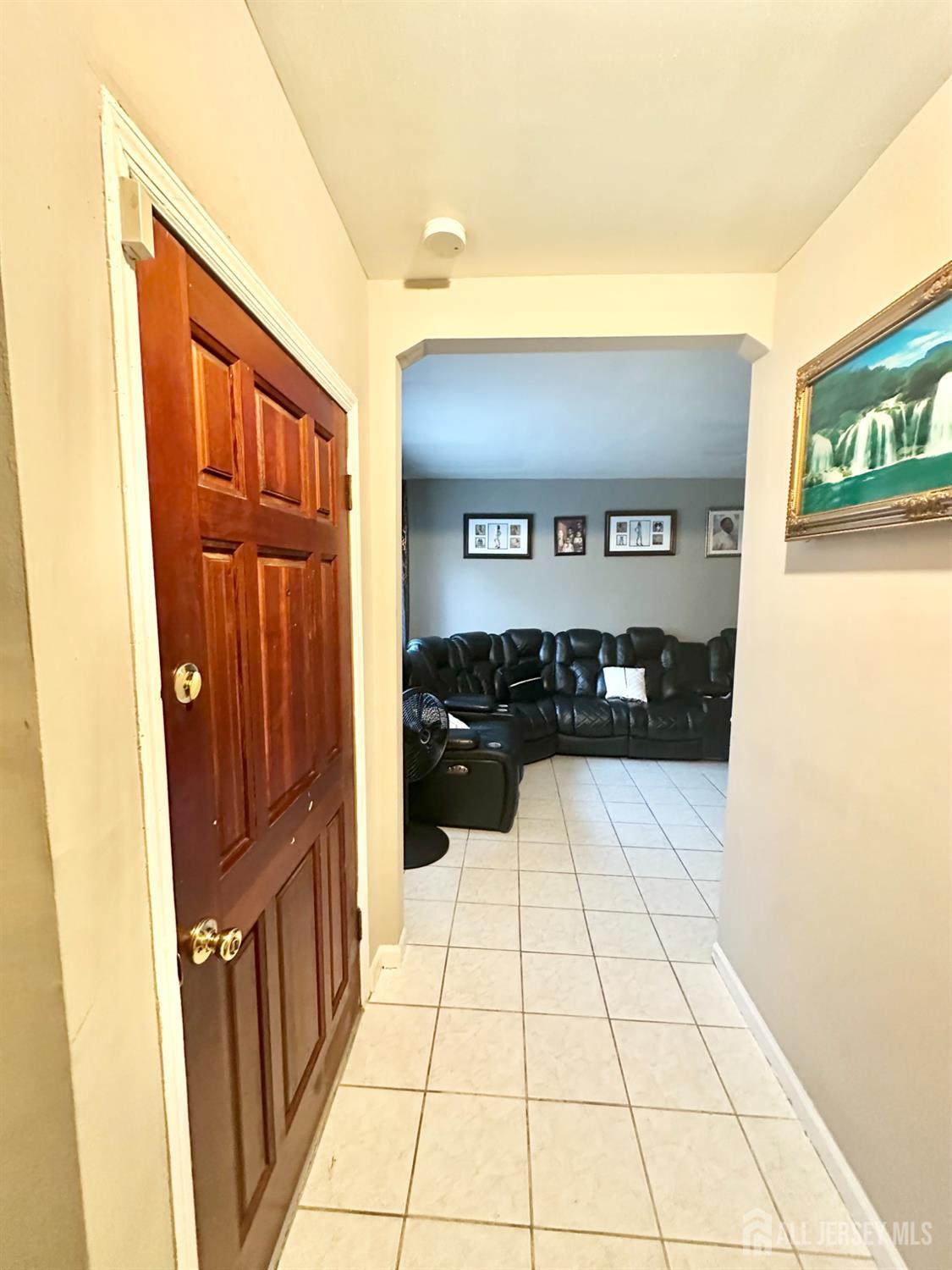 44 South Ward Street New Brunswick, NJ 08901 - Photo 15 of 34 a view of a refrigerator in an empty room and mirror